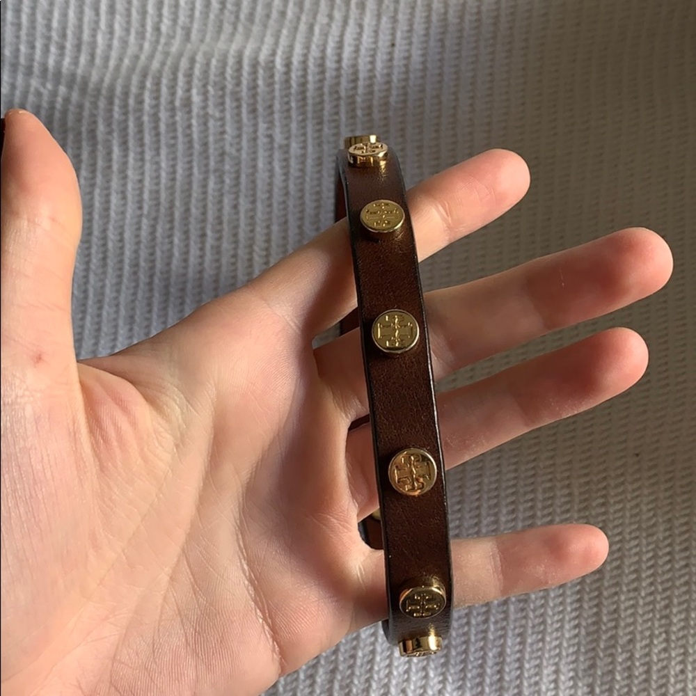 Leather and gold wrap around tory Burch  bracelet